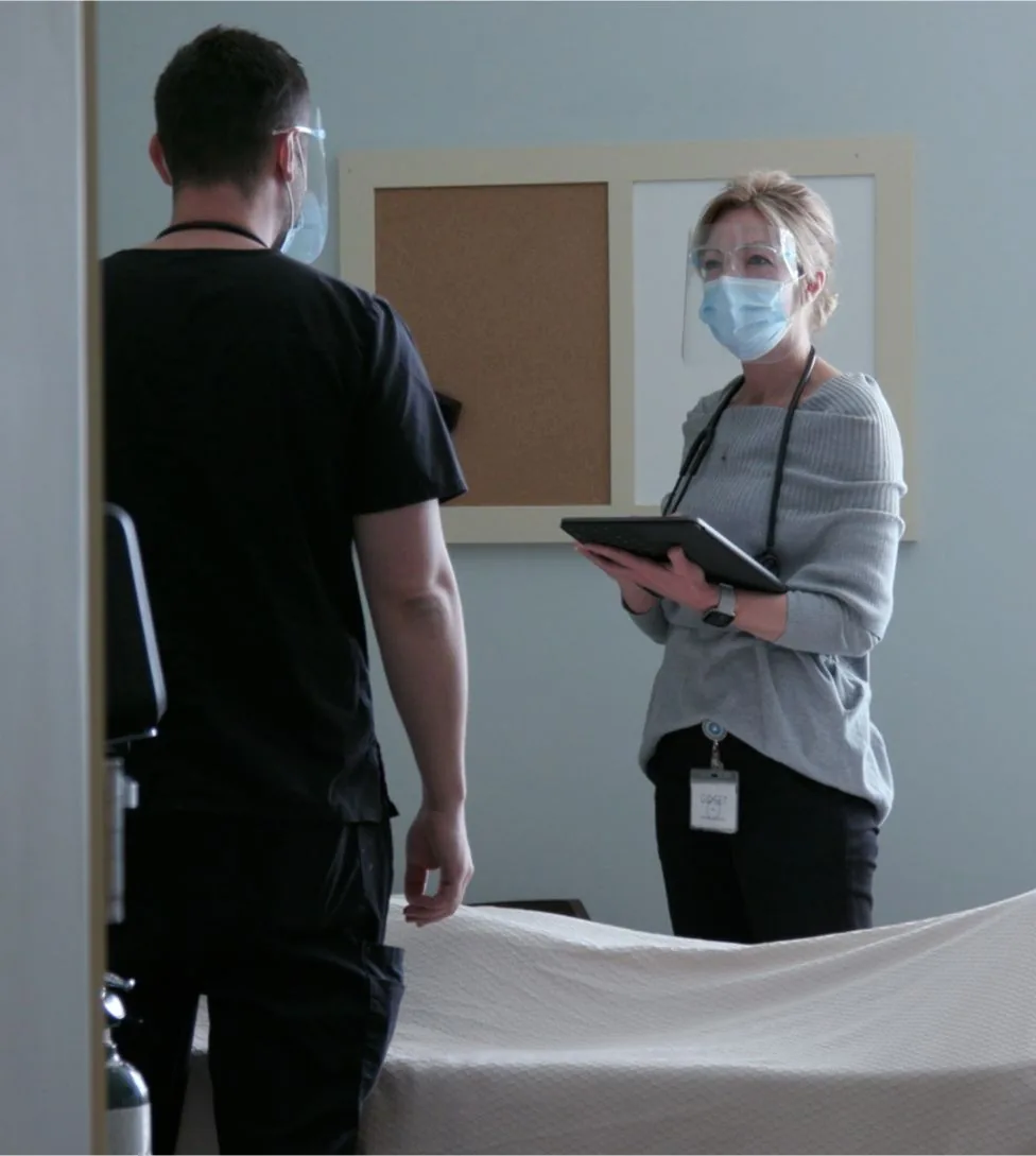 Respiratory therapist assisting patient at Briar